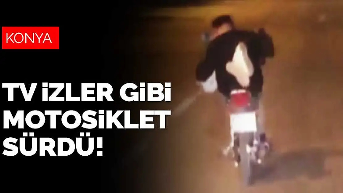 Konya'da televizyon izler gibi motosiklet süren genç diğer sürücülerin kamerasına takıldı