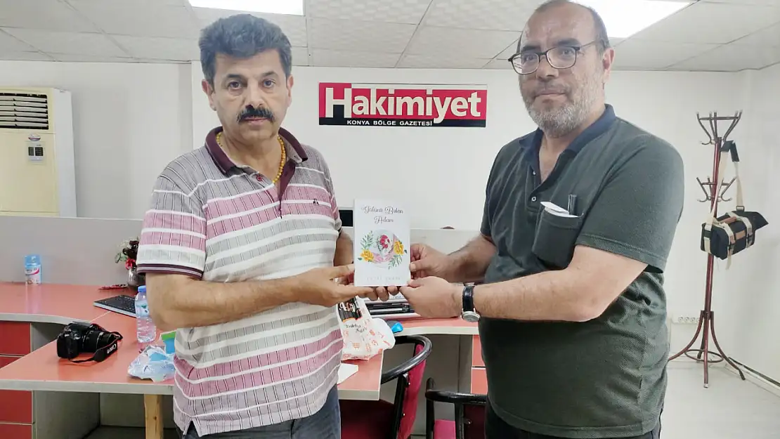 Şahin Gürbüz'e kitap hediye etti