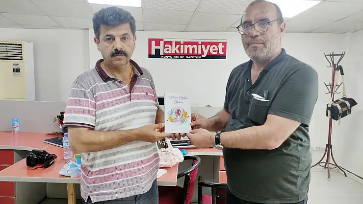 Şahin Gürbüz'e kitap hediye etti